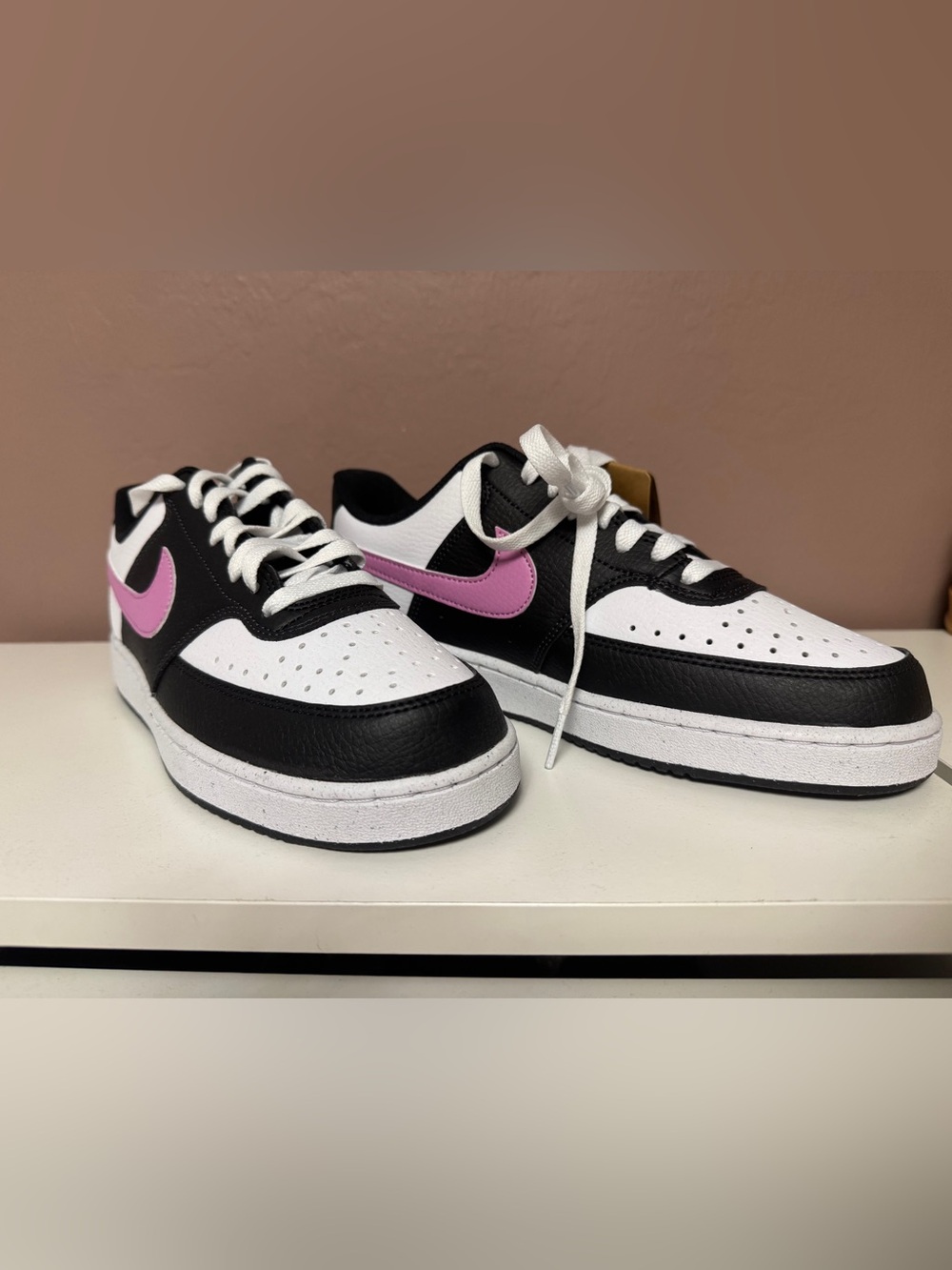Nike  Black & White Sneakers with Pink Swoosh Accent